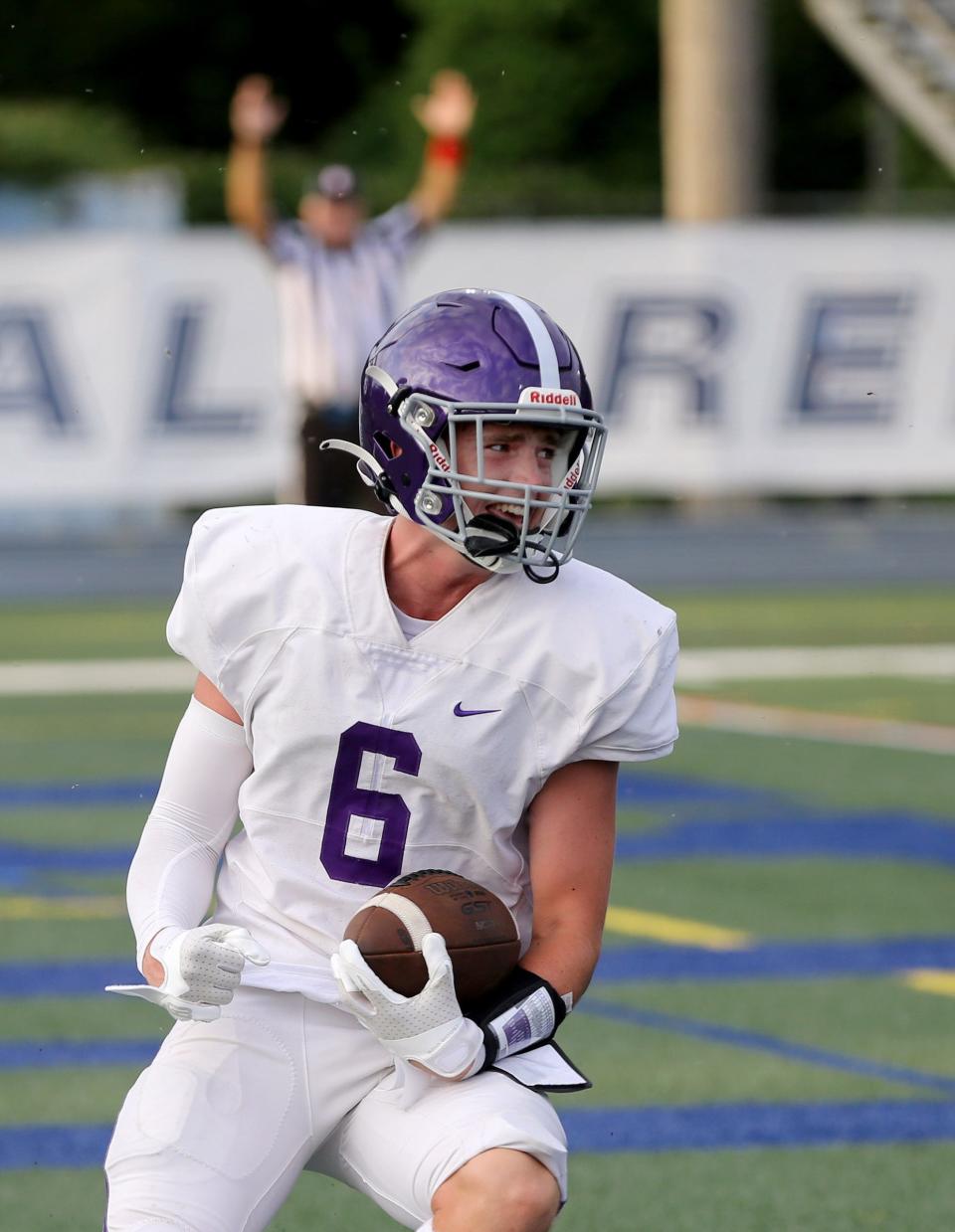 Rumson-Fair Haven's Nick Rigby smiles after scoring the games first touchdown against Middletown South at Middletown Friday evening, August 25, 2023.