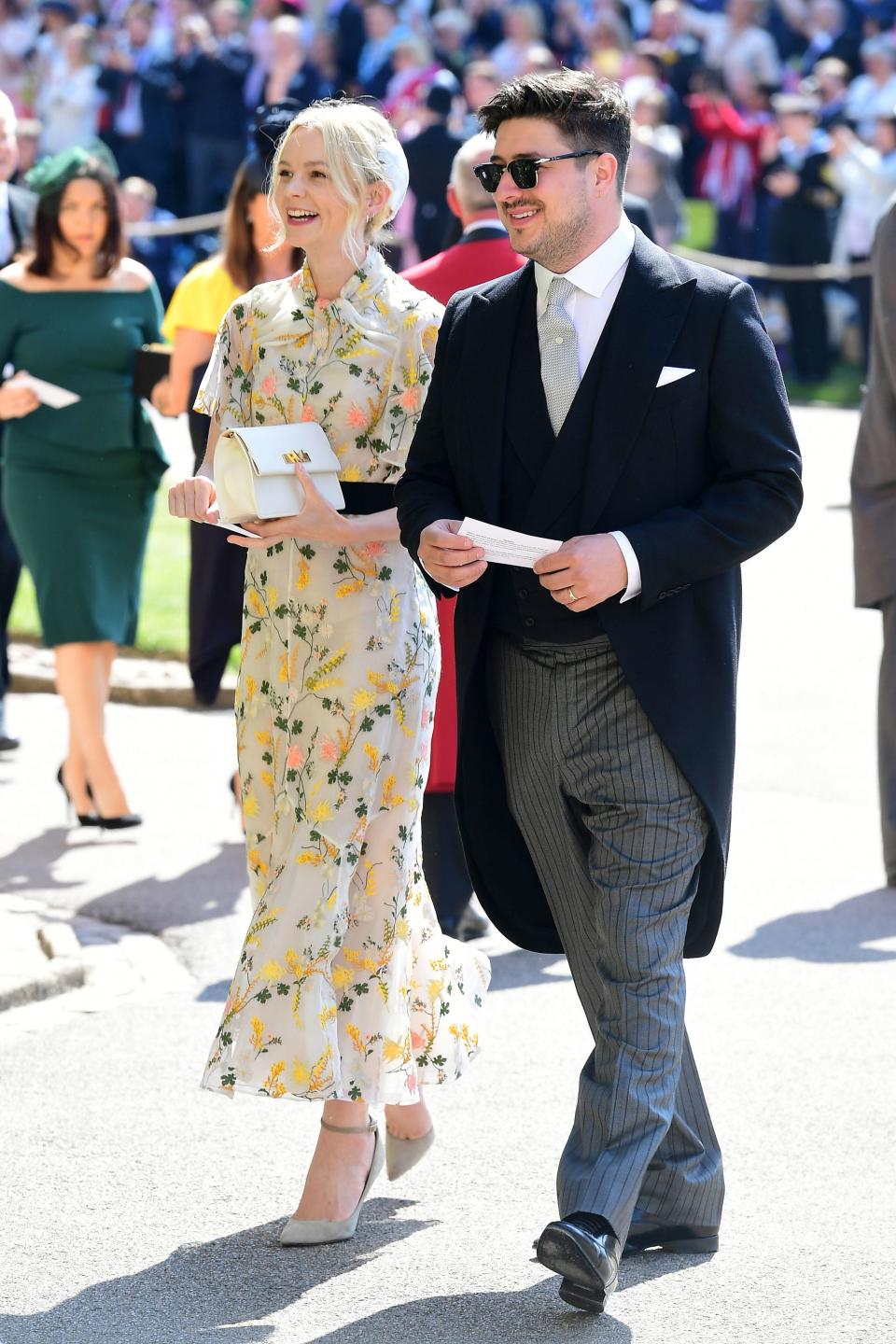 Oscar nominee Carey Mulligan, left, and husband Marcus Mumford attend the wedding of Prince Harry and Duchess Meghan in 2018.