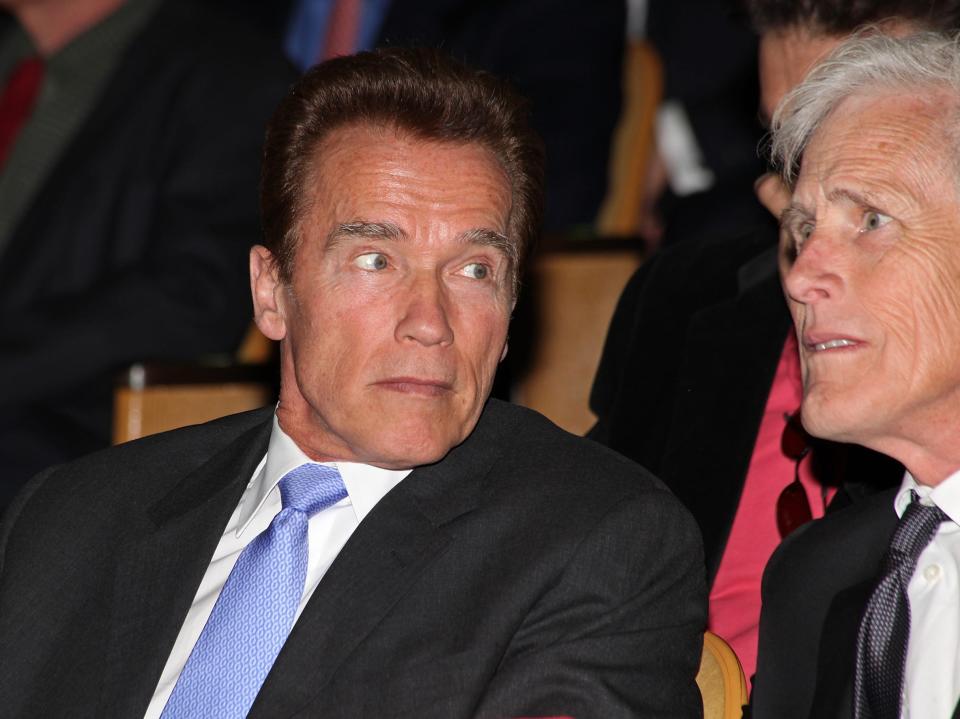 Arnold Schwarzenegger and Keith Morrison attend the godfather of fitness Jack LaLanne's "Celebration of Life" memorial service at Forest Lawn Cemetery.