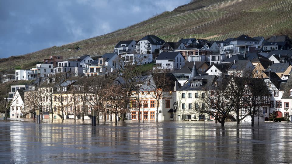 The high water level of the river Moselle has reached houses along its banks in Bernkastel-Kues, Germany, on January 4, 2024. - Harald Tittel/AP