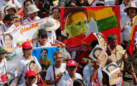 Supporters of Suu Kyi gather in Yangon - Credit: REUTERS