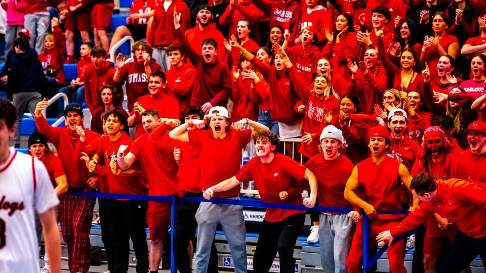 Old Rochester's student section celebrates as their team beat Pittsfield 82-72 to advance to the Div. 3 State Finals.