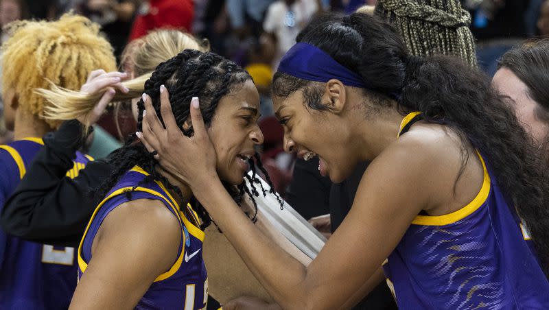 LSU’s Angel Reese, at right, hugs teammate Alexis Morris, left, after defeating Utah in a Sweet 16 college basketball game of the NCAA Tournament in Greenville, S.C., Friday, March 24, 2023. 