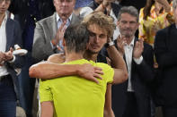 Germany's Alexander Zverev hugs Spain's Rafael Nadal, after their semifinal match of the French Open tennis tournament at the Roland Garros stadium Friday, June 3, 2022 in Paris. Alexander Zverev stopped playing because of an injury. (AP Photo/Michel Euler)