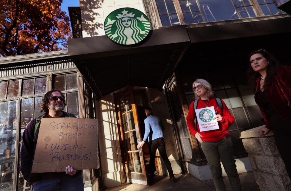 Members and supporters of Starbucks Workers United protest outside of a Starbucks store in Dupont Circle on November 16, 2023 in Washington, DC (Getty Images)