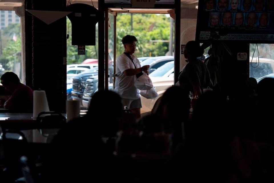 Guests carry out Vietnamese dishes at Kim Long in Biloxi on Wednesday, Aug. 2, 2023. Hannah Ruhoff/Sun Herald