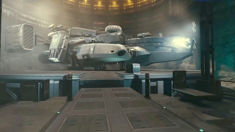 The Mantis' Razorleaf sits docked at the bottom of a lair hangar in Starfield.