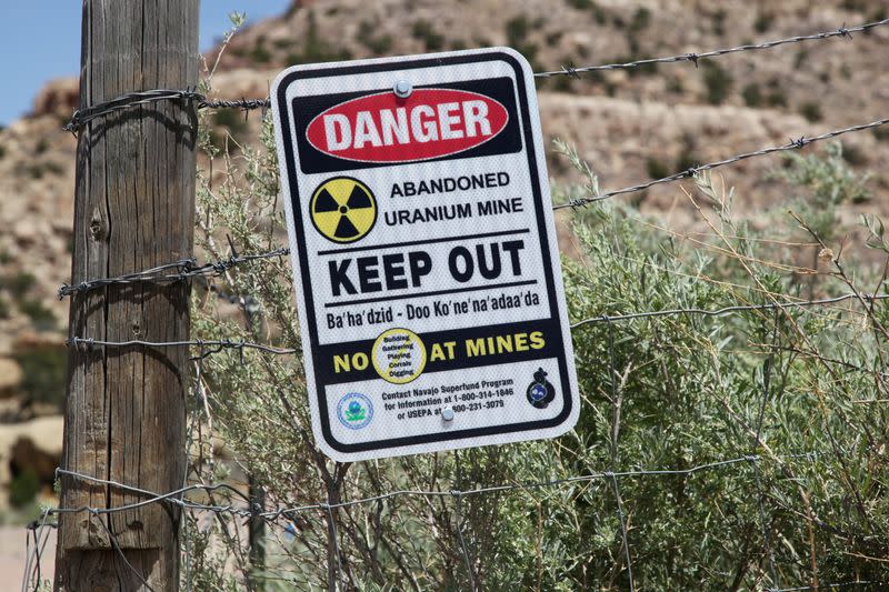 FILE PHOTO: A warning sign is seen next to the entry to the Northeast Church Rock abandoned uranium mine in Pinedale