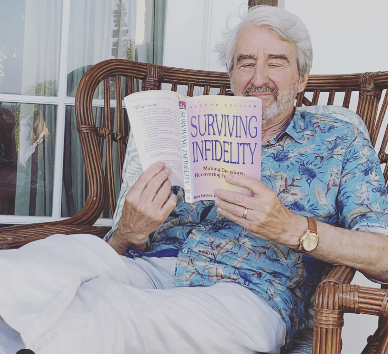 sam Waterston from grace and frankie reading a book