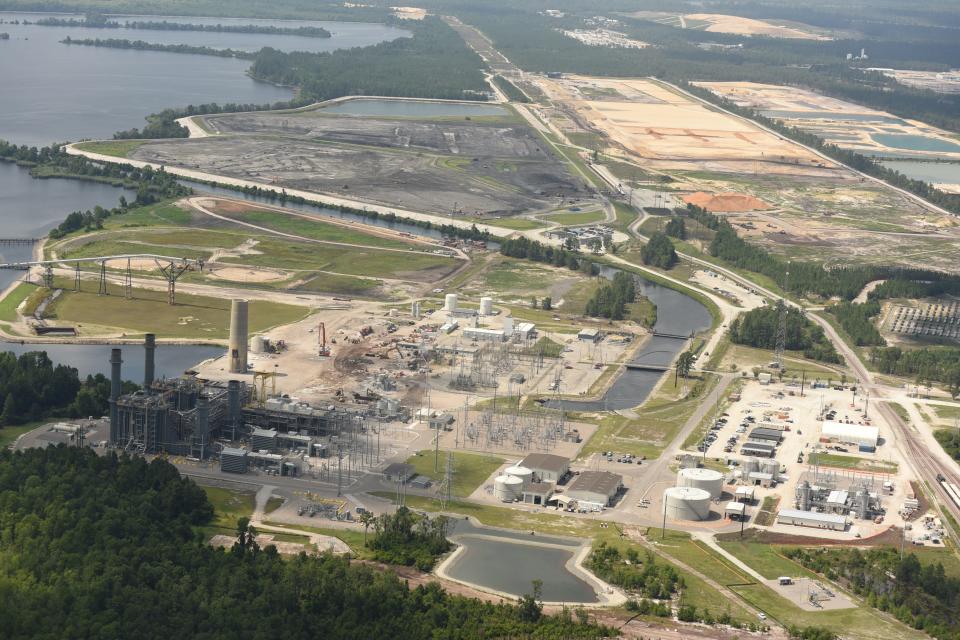 A 2017 aerial shot of the Sutton plant showing the coal-ash basins adjacent to Sutton Lake near the top of the picture and the natural gas plant in the lower left.