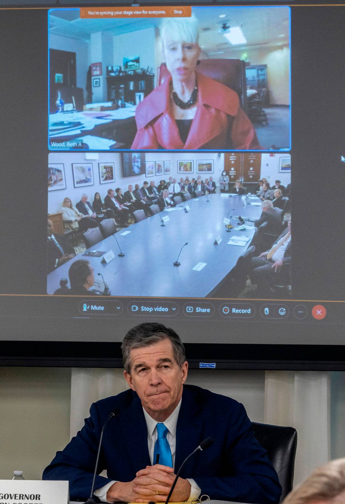 State Auditor Beth Wood speaks by video call while addressing the monthly Council of State meeting Tuesday, Feb. 7, 2022 at the NCDOT building in Raleigh. Wood faces hit-and-run charges from a December car crash in downtown Raleigh.