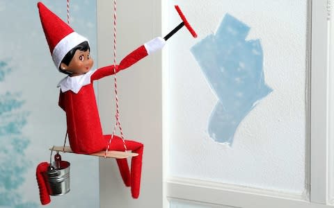 Elf doing some chores before the family comes over for Christmas. - Credit: ® and © CCA and B, LLC. All rights reserved.