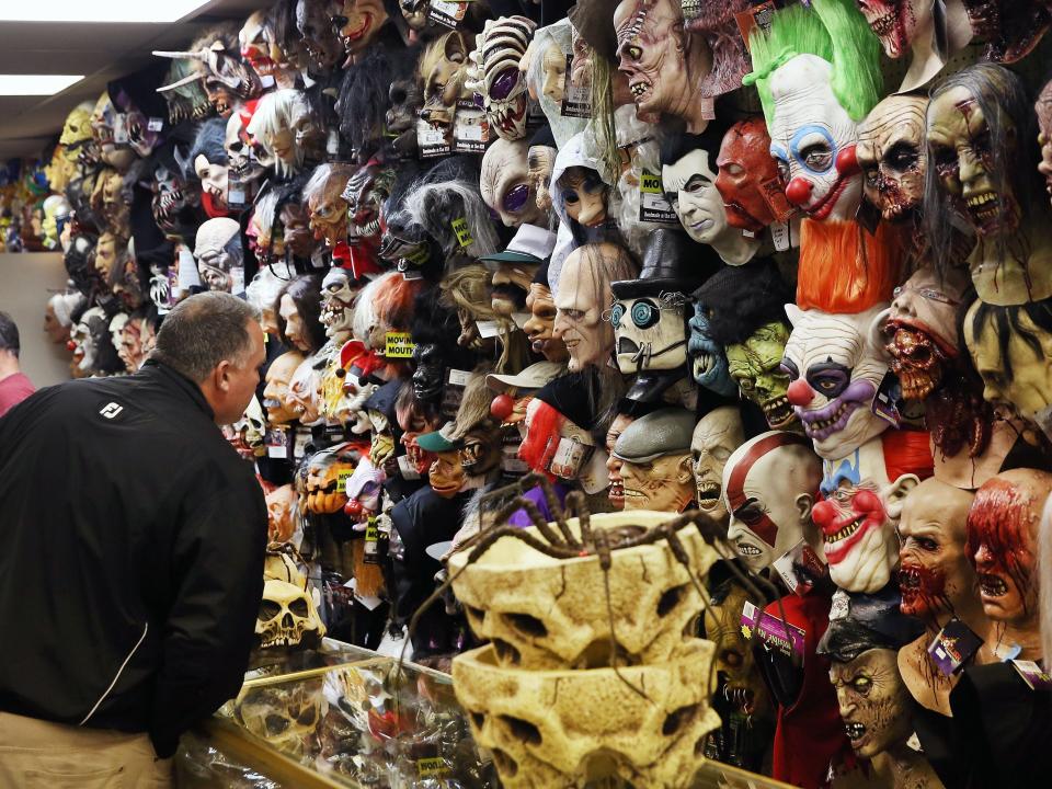 halloween store wall of masks