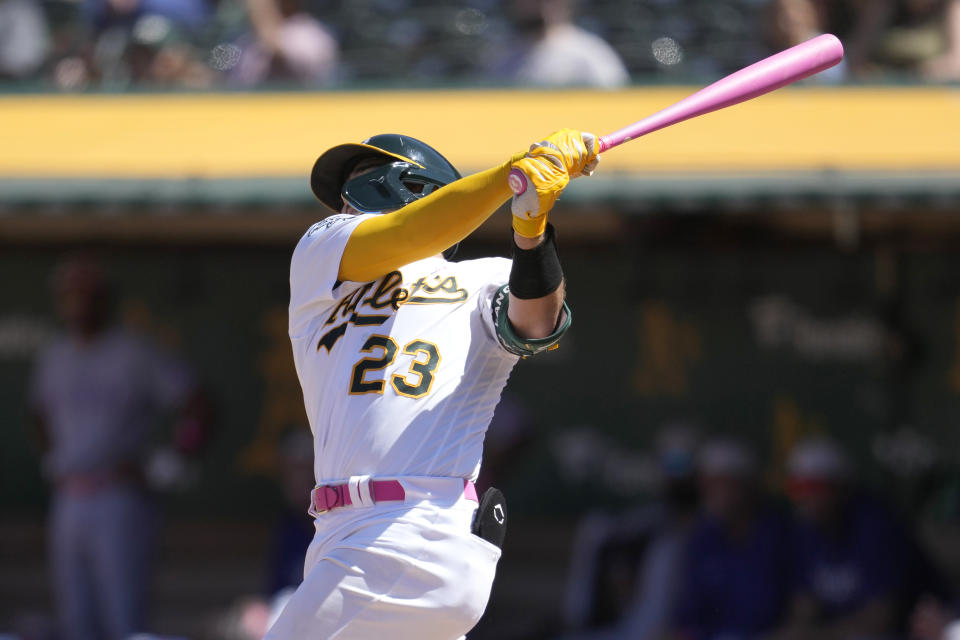 Oakland Athletics' Shea Langeliers (23) hits a two-run home run during the seventh inning of a baseball game against the Texas Rangers in Oakland, Calif., Sunday, May 14, 2023. (AP Photo/Jeff Chiu)