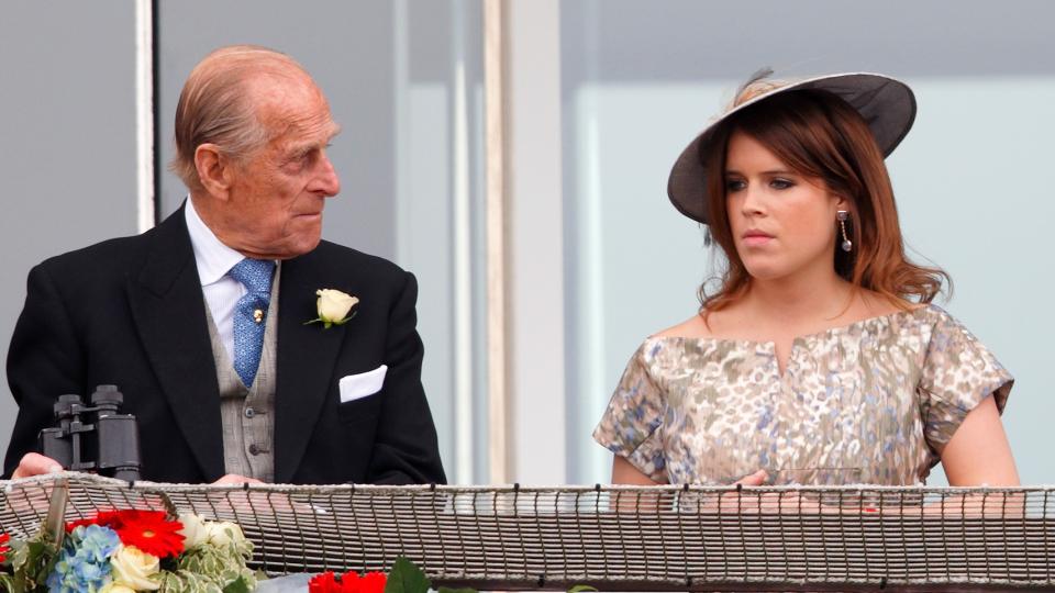 Prince Philip, Duke of Edinburgh and Princess Eugenie of York watch the racing as they attend Derby Day