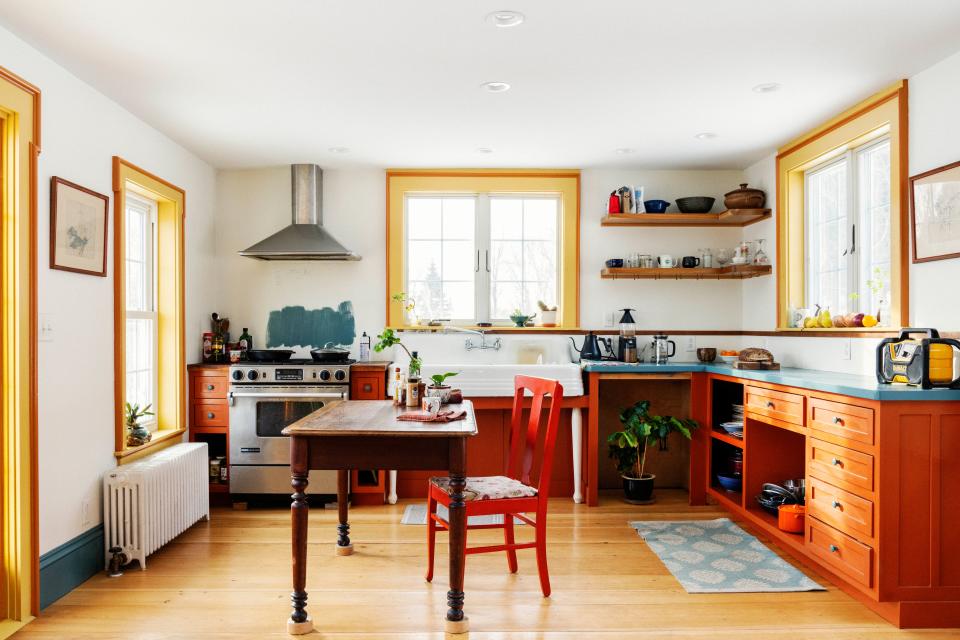 Window sills act like small shelves in this colorful Maine home.