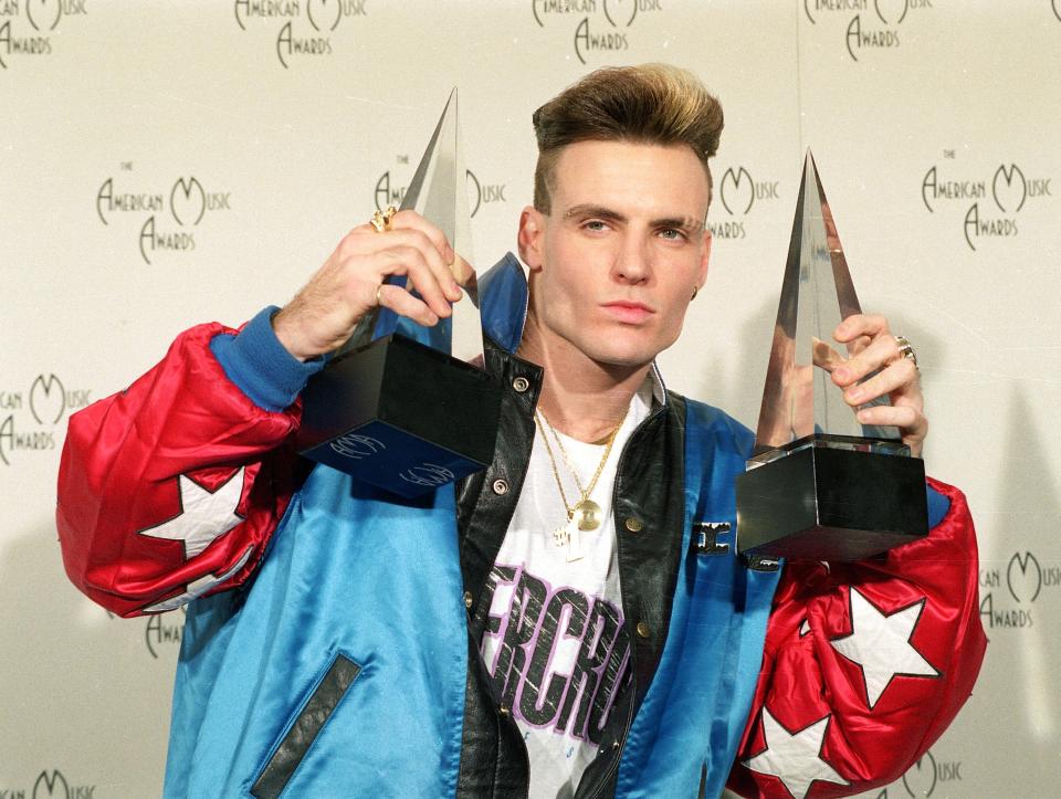 Vanilla Ice displays his awards he won in the rock and rap categories at the American Music Awards in this 1991 file photo.