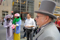 NEW YORK, NY - APRIL 24: Parade goers model their hats and bonnets during the 2011 Easter parade and Easter bonnet festival on the Streets of Manhattan on April 24, 2011 in New York City. (Photo by Jemal Countess/Getty Images)