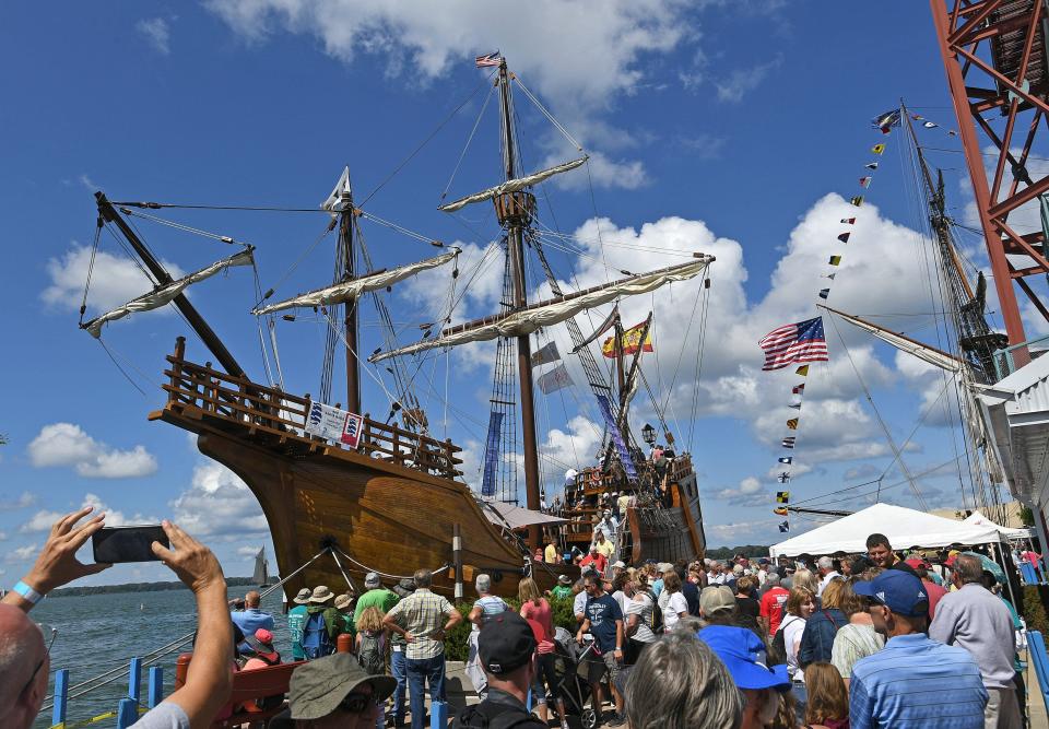 Large crowds wait to tour the tall ship Santa Maria, docked Aug. 23, 2019, at Dobbins Landing on Presque Isle Bay in Erie. The ship  has been renamed the Nao Trinidad, a replica of a 15th-century square sail ship, built to celebrate the Spanish city of Huelva's 525th anniversary. It is expected to take part in the 2022 Tall Ships Erie festival.