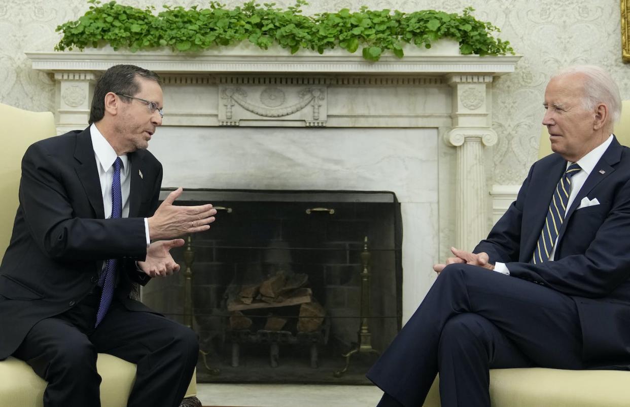 U.S. President Joe Biden meets with Israel's President Isaac Herzog in the Oval Office of the White House in Washington on July 18, 2023. (AP Photo/Susan Walsh)