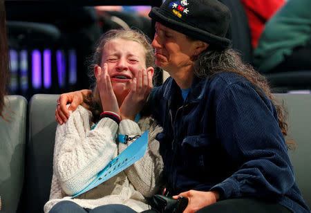 Anita Beroza of Belmont, California, is comforted after she was eliminated, May 30, 2018. REUTERS/Kevin Lamarque
