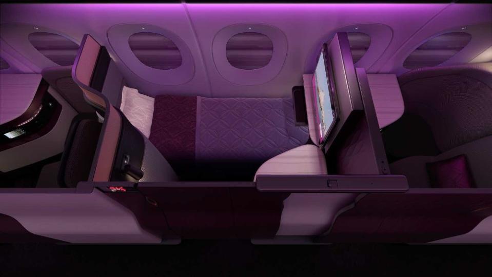 You can snag award seats in Qatar Airways’ Qsuite cabin using oneworld miles. - Credit: Courtesy Qatar Airways