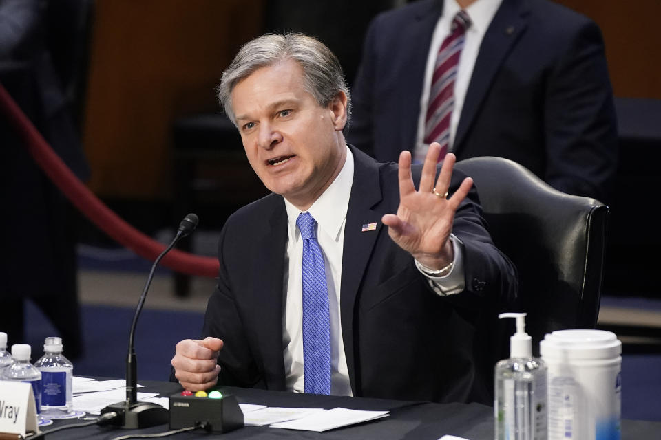 FBI Director Christopher Wray testifies before the Senate Judiciary Committee on Capitol Hill in Washington, Tuesday, March 2, 2021. Wray is condemning the Jan. 6 riot at the Capitol as “domestic terrorism.”  (AP Photo/Patrick Semansky)