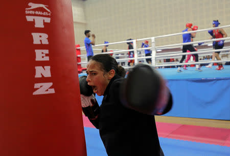 France's Amina Zidani trains with a punching bag during her practice session ahead of AIBA Women's World Boxing Championships at Indira Gandhi Indoor Stadium in New Delhi, India, November 12, 2018. REUTERS/Anushree Fadnavis
