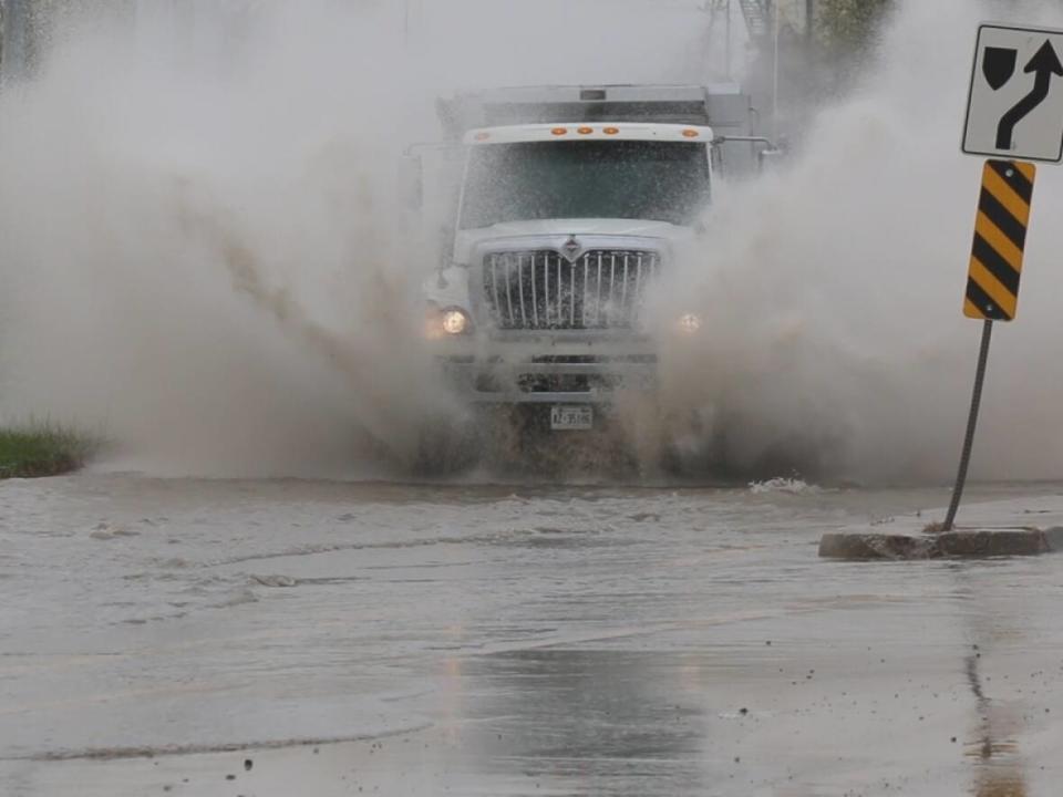 Environment Canada says heavy rainfall and frozen ground may lead to water pooling in the road. (Tony Smyth/CBC - image credit)