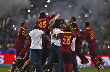 Cricket - England v West Indies - World Twenty20 cricket tournament final - Kolkata, India - 03/04/2016. West Indies players celebrate after winning the final. REUTERS/Adnan Abidi