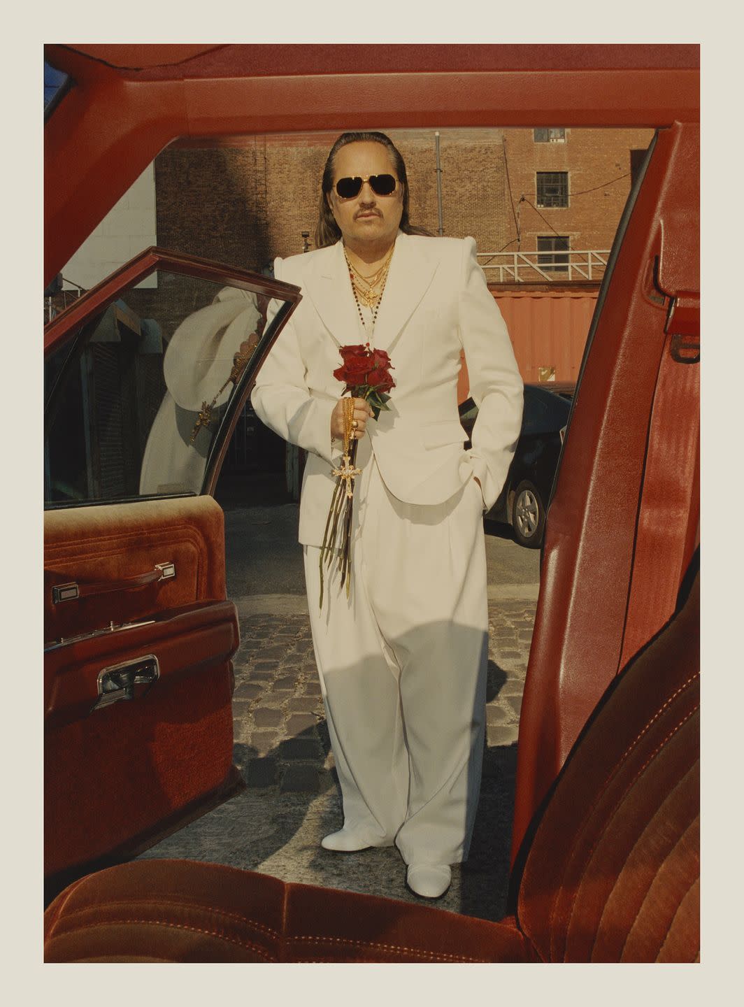 willy chavarria in a white suit