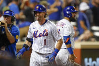 New York Mets' Jeff McNeil (1) celebrates after hitting a home run against the Cincinnati Reds during the fourth inning of a baseball game Tuesday, Aug. 9, 2022, in New York. (AP Photo/Frank Franklin II)