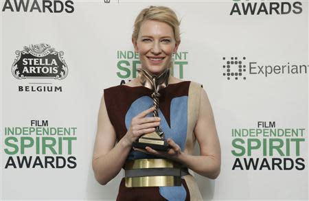 Actress Cate Blanchett holds her Best Female Lead award for "Blue Jasmine" backstage at the 2014 Film Independent Spirit Awards in Santa Monica, California March 1, 2014. REUTERS/Danny Moloshok