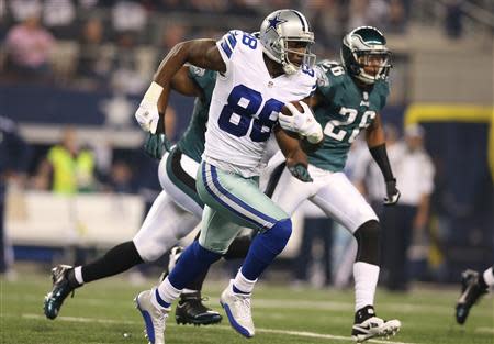 Dec 29, 2013; Arlington, TX, USA; Dallas Cowboys receiver Dez Bryant (88) runs after a reception against the Philadelphia Eagles at AT&T Stadium. Mandatory Credit: Matthew Emmons-USA TODAY Sports