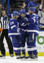 Tampa Bay Lightning center Anthony Cirelli (71) celebrates his goal against the Toronto Maple Leafs with right wing Ryan Callahan (24) and defenseman Dan Girardi (5) during the first period of an NHL hockey game Thursday, Dec. 13, 2018, in Tampa, Fla. (AP Photo/Chris O'Meara)