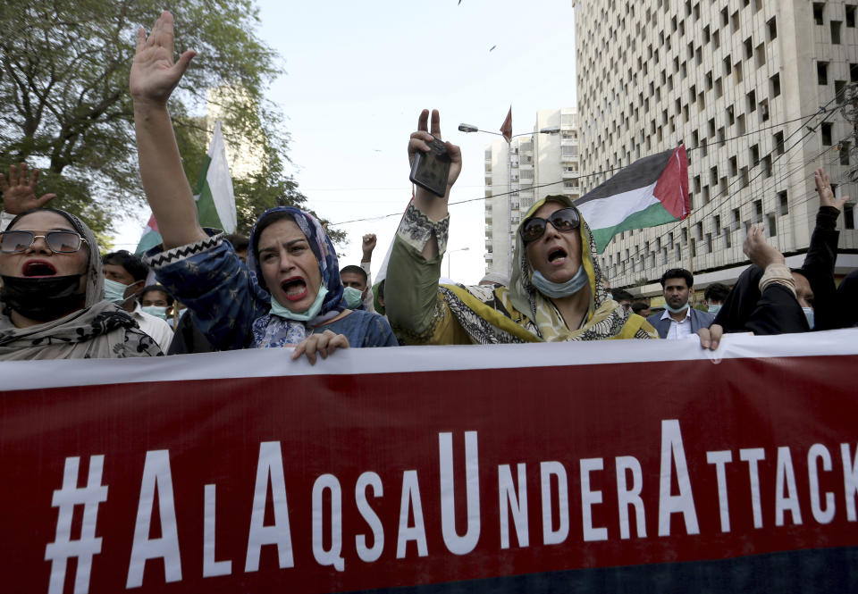 Members of a civil society group chant anti-Israeli slogans during a demonstration in support of Palestinians during the latest round of violence in Jerusalem, in Karachi, Pakistan, Tuesday, May 11, 2021. (AP Photo/Fareed Khan)