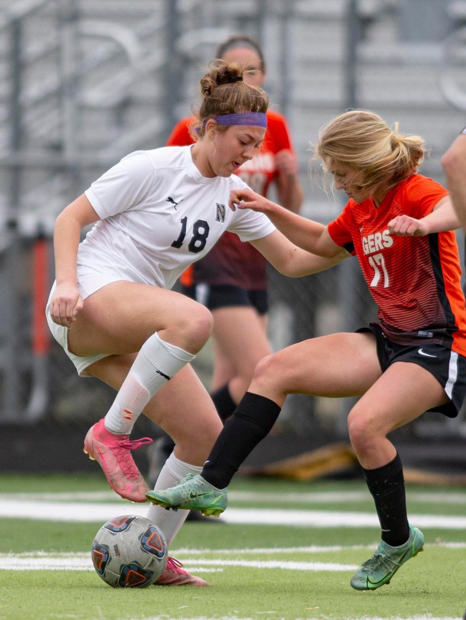 Belvidere North's Cortlyn Hefty defends the ball on Tuesday, May 24, 2022, at Freeport High School in Freeport.