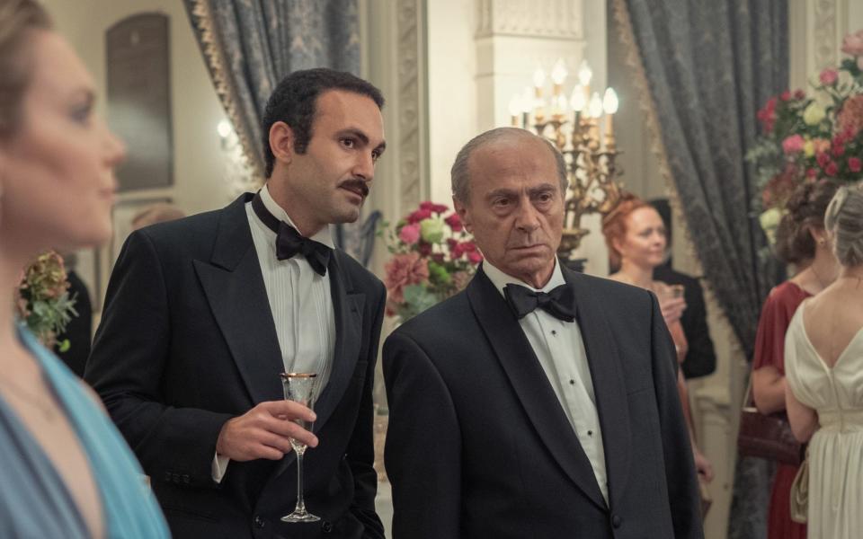 Khalid Abdalla as Dodi Fayed and Salim Daw as Mohamed Al Fayed in "The Crown."