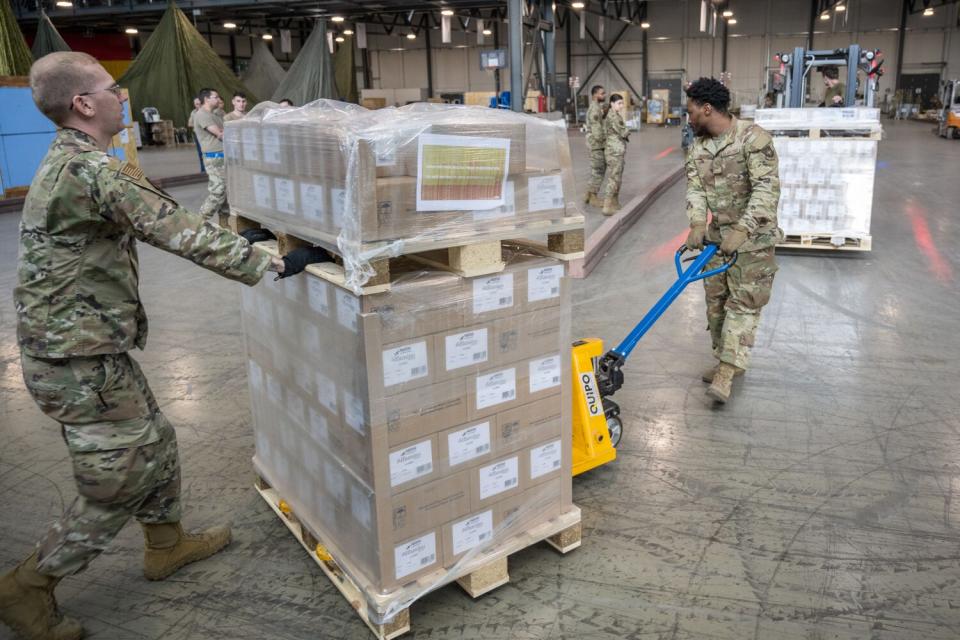 U.S. airmen load pallets with baby formula which arrived by three trucks from Switzerland for the United States at Ramstein American Air Force base on May 21, 2022 in Ramstein-Miesenbach, Germany. A total of 32500 KG will be flown to the USA tomorrow morning. The U.S. government has launched Operation Fly Formula, in which the Agriculture Department, the Department and the Department of Health and Human Services and the Pentagon are cooperating to find alternative sources of baby formula from abroad after Abbott Laboratories temporarily closed a Michigan manufacturing plant following possible contamination in February. The closing has resulted in a nationwide shortage of baby formula.