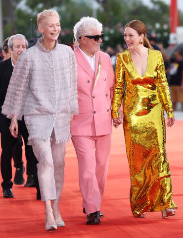 <p>Daniele Venturelli/WireImage</p> Tilda Swinton, Pedro Almodovar and Julianne Moore