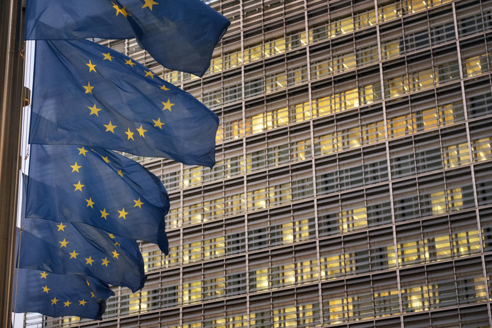 The Chancellor has warned if there is no trade deal Britain could lower corporation tax to attract businesses putting relations at risk. Pictured are flags outside the European Parliament, in Brussels.