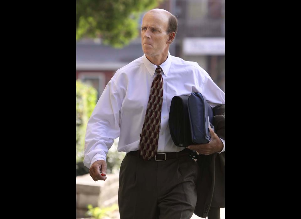 FILE - In this July 15, 2009 file photo, Calvin Harris walks to Tioga County Court in Owego, N.Y. Harris, a prominent auto dealer imprisoned for the murder of his estranged wife, will have his case heard by New York. Michele Harris' body was never found and she has not been seen since Sept. 11 or 12, 2001. Blood was found in the Harrises kitchen, but investigators never located a murder weapon. 
