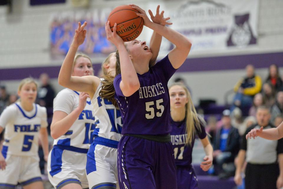 Albany's Madi Herkenhoff goes up for the shot after contact against Foley at Albany High School on Friday, Jan. 28, 2022. 