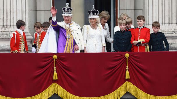 PHOTO: Britain's King Charles and Queen Camilla stand on the Buckingham Palace balcony following their coronation ceremony in London, Britain May 6, 2023. (Hannah Mckay/Reuters)