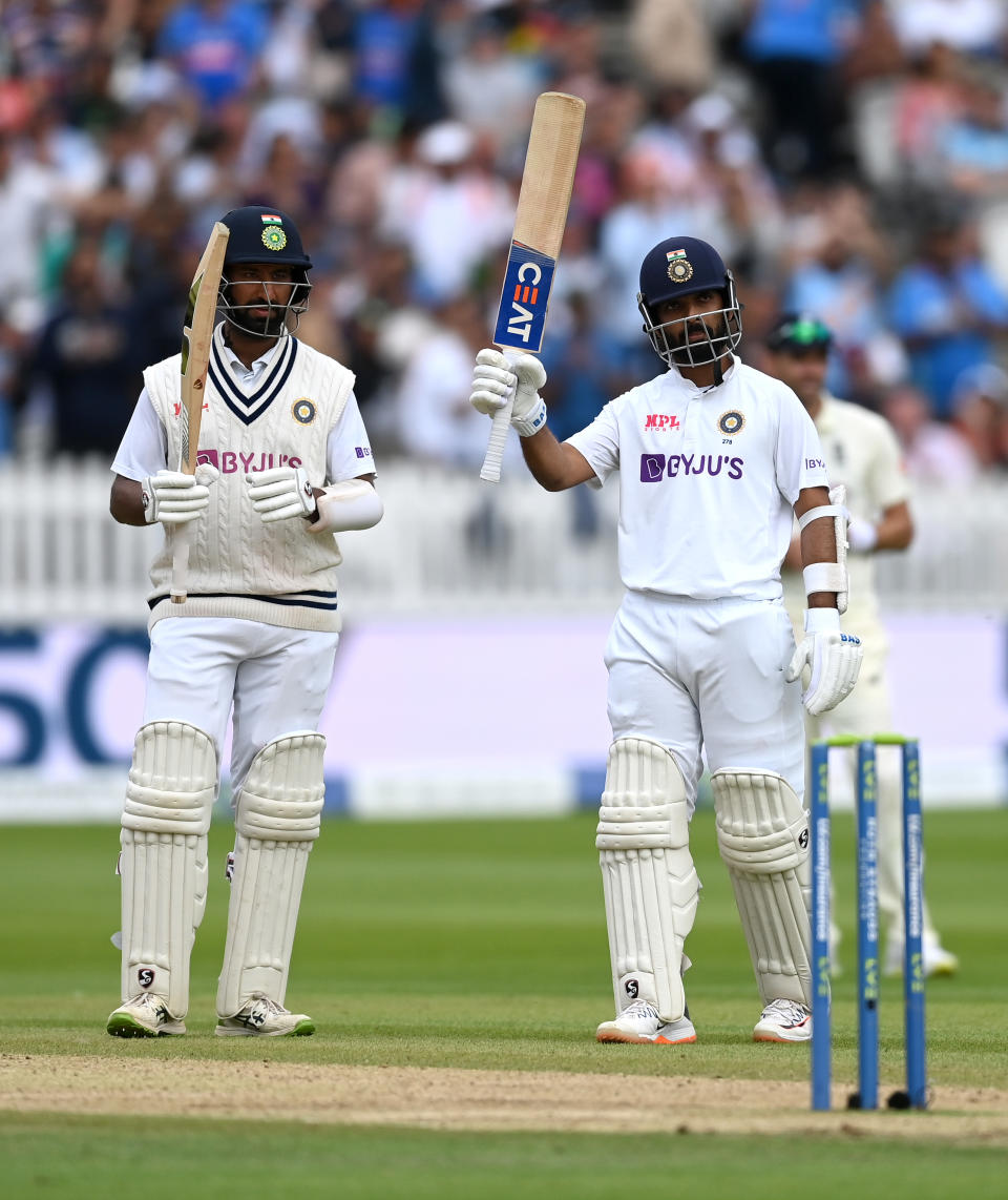 LONDON, ENGLAND - AUGUST 15: Ajinkya Rahane of India salutes after reaching his half century alongside Cheteshwar Pujara during day four of the Second LV= Insurance Test Match between England and India at Lord's Cricket Ground on August 15, 2021 in London, England. (Photo by Gareth Copley/Getty Images)