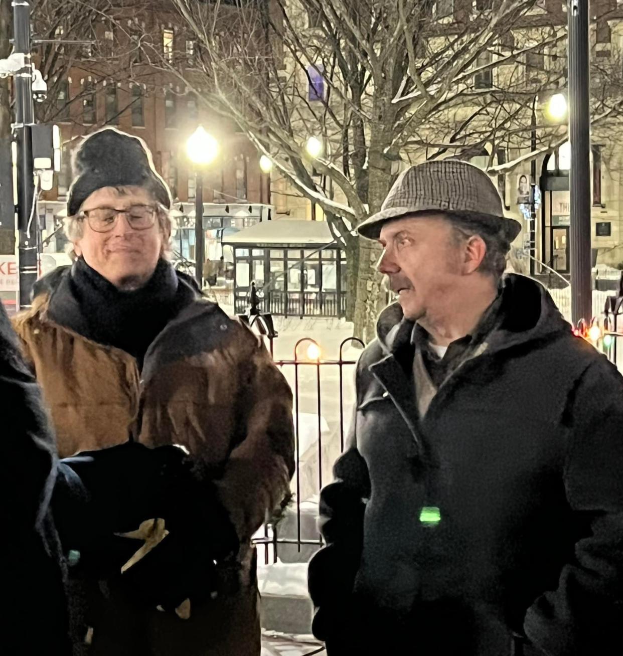 From left, director Alexander Payne and actor Paul Giamatti after wrapping a scene for "The Holdovers" shot on the Worcester Common Feb. 26, 2022.
