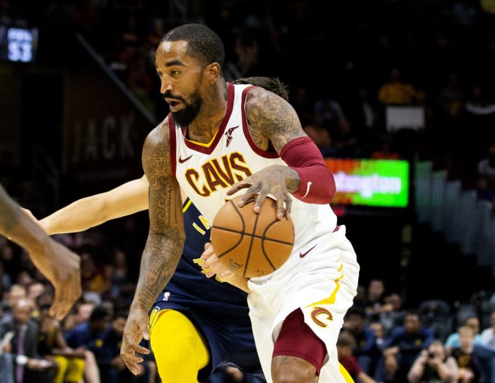 FILE - In this Oct. 8, 2018, file photo, Cleveland Cavaliers guard J.R. Smith dribbles to the basket.