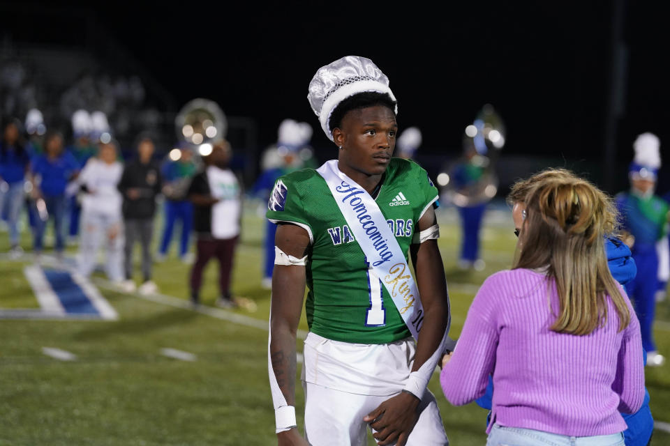 Cameron Calhoun wins Homecoming King Friday night at Winton Woods