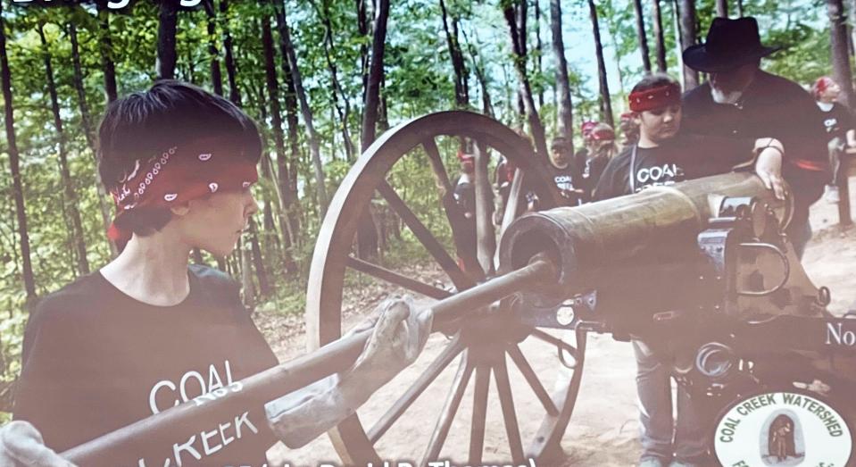 Barry Thacker took Briceville Elementary School students on a field trip to Militia Hill near Coal Creek (now Rocky Top) to witness the firing of a cannon. It is like the ones used by the Tennessee National Guard to defeat the Welsh miners opposing convict leasing in the 1891-92 Coal Creek War.