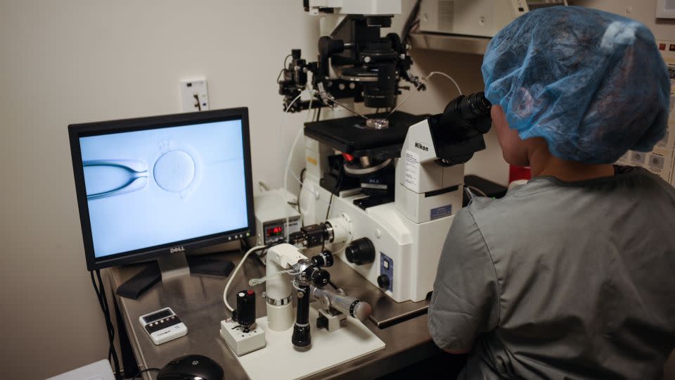 An embryologist is at work at the Virginia Center for Reproductive Medicine on June 12, 2019. - Ivan Couronne/AFP/Getty Images
